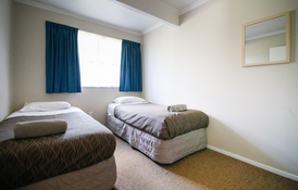 lounge and bedroom of 2-bedroom unit